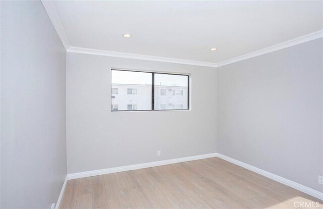 8641 Glenoaks Blvd Unit 107, Sun Valley, CA 91352 - unfurnished room featuring light wood-style flooring, baseboards, crown molding, and recessed lighting