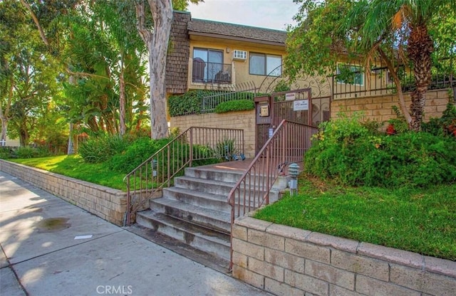 8641 Glenoaks Blvd Unit 107, Sun Valley, CA 91352 - view of front of home with stairway and mansard roof