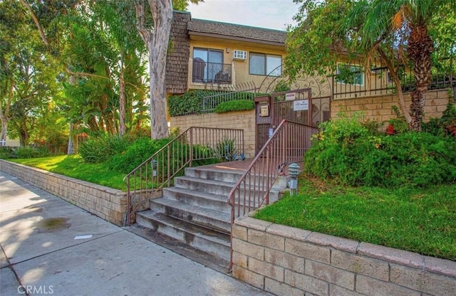 8641 Glenoaks Blvd Unit 107, Sun Valley, CA 91352 - townhome / multi-family property with stairway and mansard roof