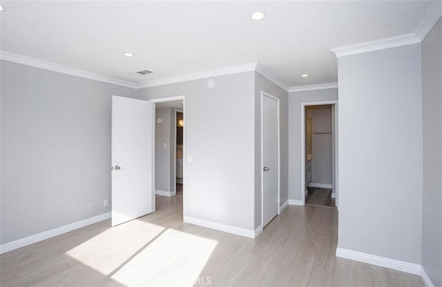 8641 Glenoaks Blvd Unit 107, Sun Valley, CA 91352 - unfurnished bedroom with crown molding, recessed lighting, baseboards, light wood-type flooring, and visible vents