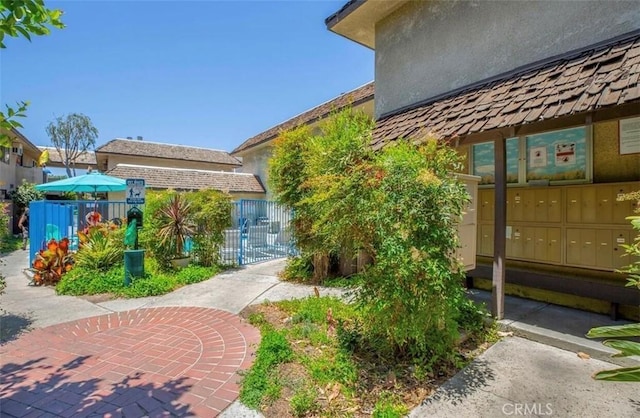 8641 Glenoaks Blvd Unit 107, Sun Valley, CA 91352 - exterior space with fence and mail area