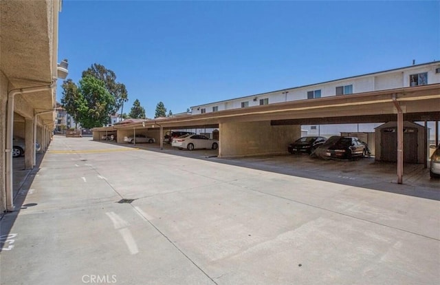 8641 Glenoaks Blvd Unit 107, Sun Valley, CA 91352 - covered parking lot featuring a storage unit