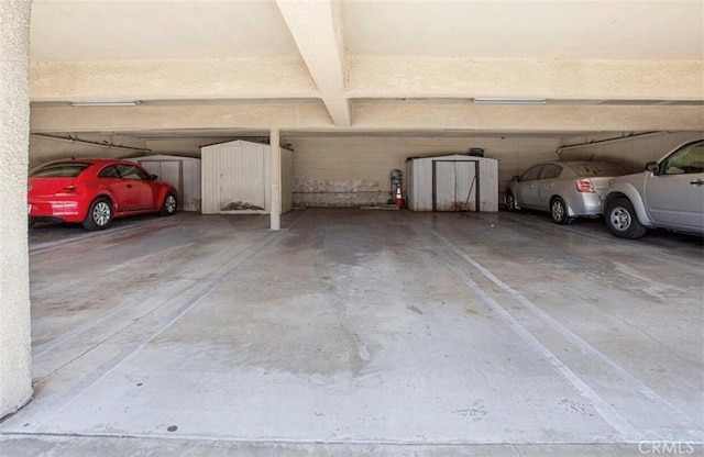 8641 Glenoaks Blvd Unit 107, Sun Valley, CA 91352 - parking deck featuring a storage shed