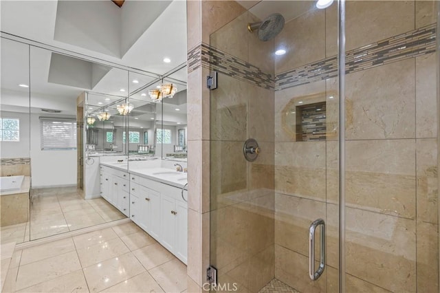 4250 Louise Ave, Encino, CA 91316 - bathroom featuring double vanity, tile patterned floors, a shower stall, and a bath