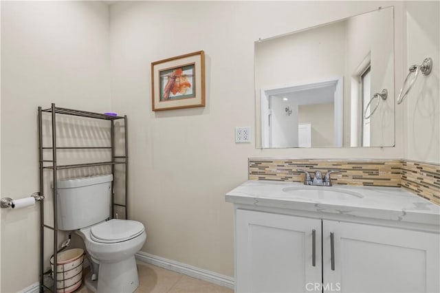 4250 Louise Ave, Encino, CA 91316 - bathroom featuring vanity, tile patterned flooring, toilet, baseboards, and tasteful backsplash