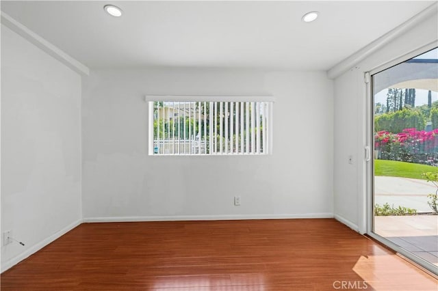 4250 Louise Ave, Encino, CA 91316 - unfurnished room with recessed lighting, baseboards, a healthy amount of sunlight, and wood finished floors