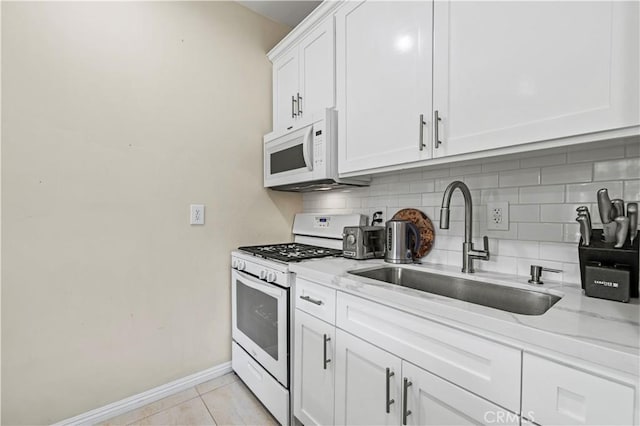 4250 Louise Ave, Encino, CA 91316 - kitchen featuring baseboards, a sink, white appliances, and tasteful backsplash
