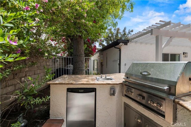 4250 Louise Ave, Encino, CA 91316 - view of patio / terrace featuring grilling area, exterior kitchen, a sink, fence, and a pergola