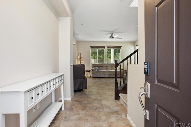 750 Arbor Glen Ln, Vista, CA 92081 - foyer entrance with baseboards, a ceiling fan, and stairs