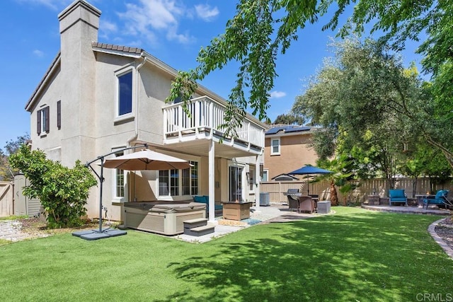 750 Arbor Glen Ln, Vista, CA 92081 - back of house with a hot tub, a patio, a chimney, and a balcony