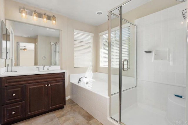 750 Arbor Glen Ln, Vista, CA 92081 - full bathroom with vanity, ceiling fan, tile patterned floors, a bath, and a shower stall
