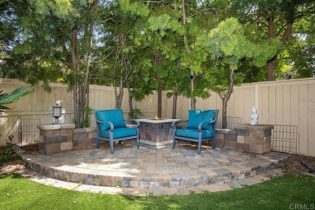 750 Arbor Glen Ln, Vista, CA 92081 - view of patio with a fire pit and a fenced backyard