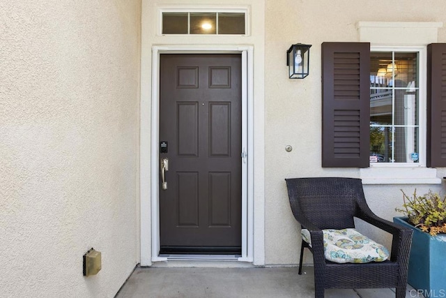 750 Arbor Glen Ln, Vista, CA 92081 - doorway to property featuring covered porch and stucco siding