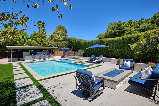 6981 Corte Langosta, Carlsbad, CA 92009 - view of pool with a patio, an outdoor living space with a fire pit, an in-ground hot tub, a fenced backyard, and a bar