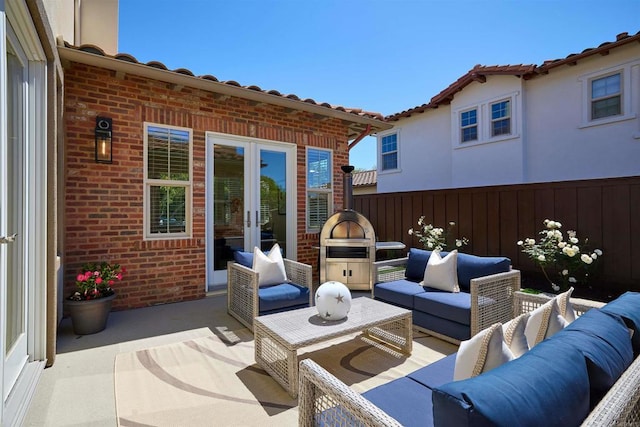 6981 Corte Langosta, Carlsbad, CA 92009 - view of patio / terrace with french doors, an outdoor hangout area, and fence