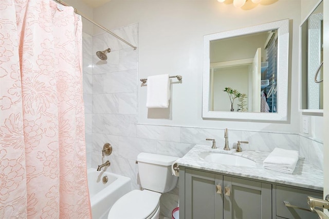 6981 Corte Langosta, Carlsbad, CA 92009 - full bath featuring vanity, toilet, shower / tub combo, and tile walls