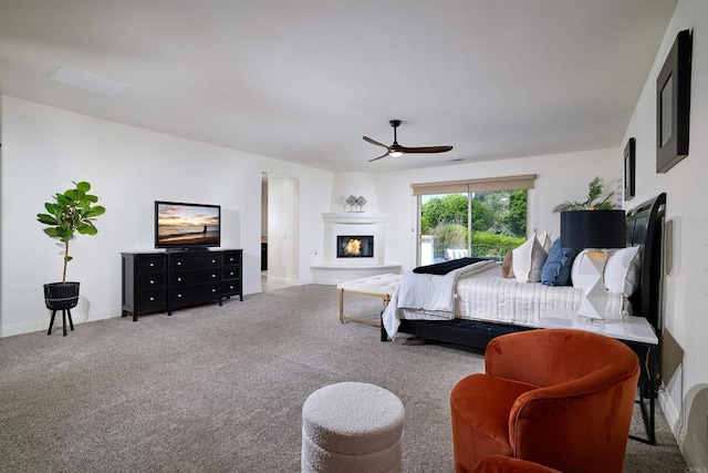 6981 Corte Langosta, Carlsbad, CA 92009 - bedroom with carpet, a fireplace, baseboards, and a ceiling fan