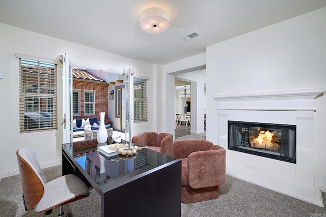 6981 Corte Langosta, Carlsbad, CA 92009 - dining space featuring carpet, a chandelier, a glass covered fireplace, and baseboards