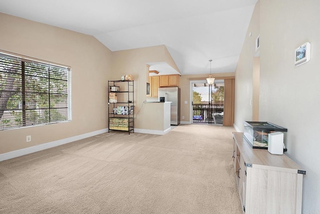 living room with light colored carpet, baseboards, visible vents, and lofted ceiling