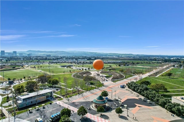 drone / aerial view featuring a mountain view