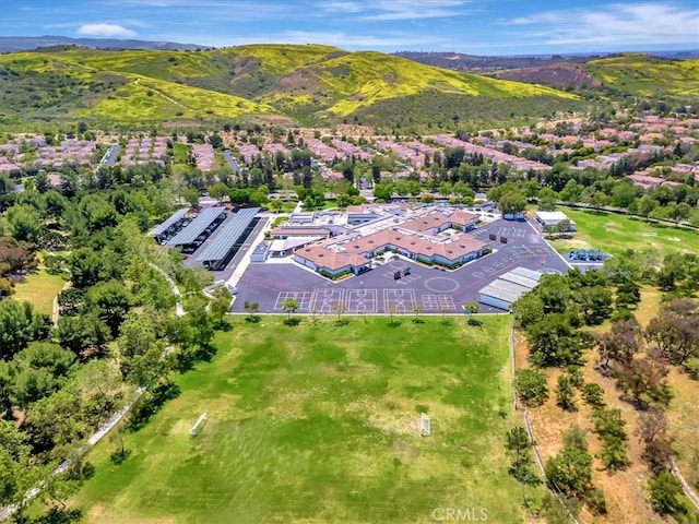 drone / aerial view with a mountain view and a residential view
