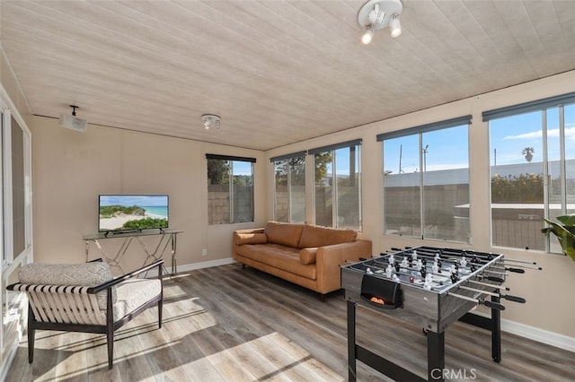 18401 Goodwin Ln, Huntington Beach, CA 92646 - sunroom / solarium featuring baseboards, wood ceiling, and wood finished floors