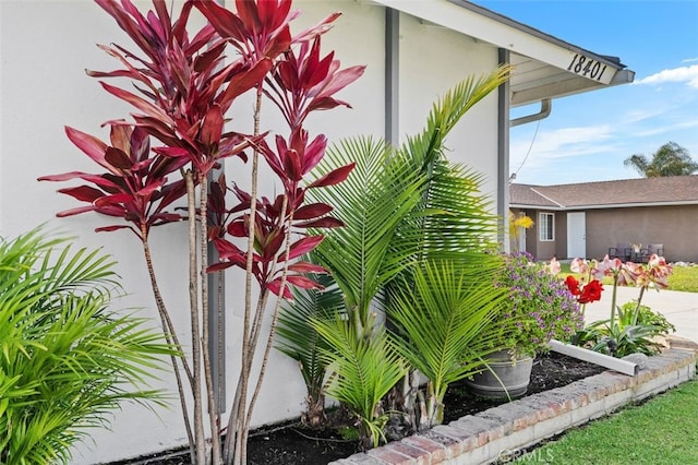 18401 Goodwin Ln, Huntington Beach, CA 92646 - exterior details featuring stucco siding and concrete driveway