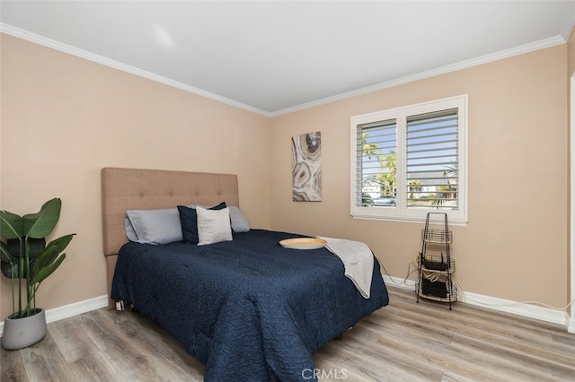 18401 Goodwin Ln, Huntington Beach, CA 92646 - bedroom featuring light wood-style floors, ornamental molding, and baseboards