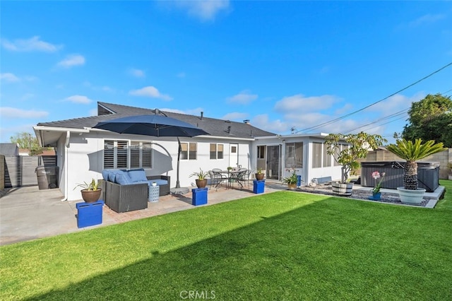 18401 Goodwin Ln, Huntington Beach, CA 92646 - back of house featuring fence, stucco siding, a sunroom, a patio area, and a yard