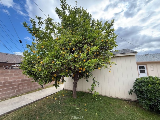7940 Lena Ave, West Hills, CA 91304 - view of side of home with roof with shingles and fence