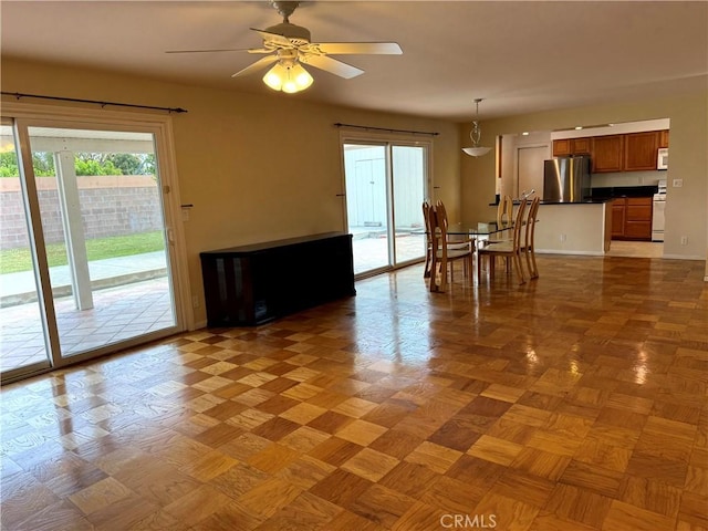 7940 Lena Ave, West Hills, CA 91304 - dining room with a ceiling fan and baseboards