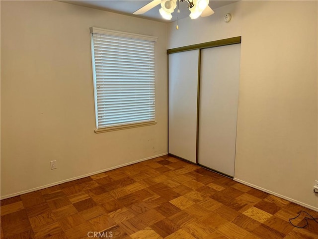 7940 Lena Ave, West Hills, CA 91304 - unfurnished bedroom with baseboards, ceiling fan, and a closet