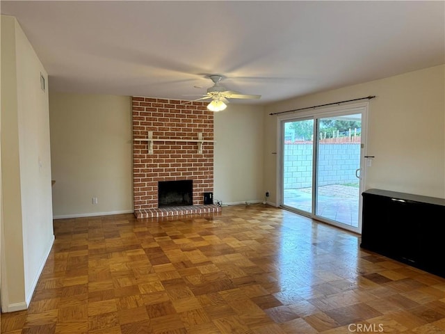 7940 Lena Ave, West Hills, CA 91304 - unfurnished living room featuring a brick fireplace, a ceiling fan, baseboards, and visible vents
