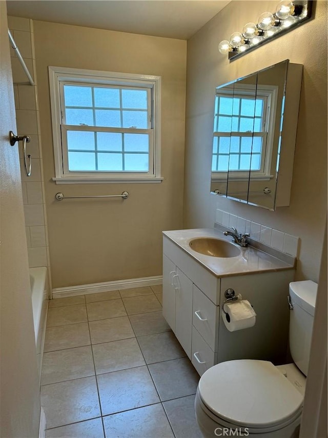 7940 Lena Ave, West Hills, CA 91304 - full bath with baseboards, tile patterned flooring, toilet, and a wealth of natural light
