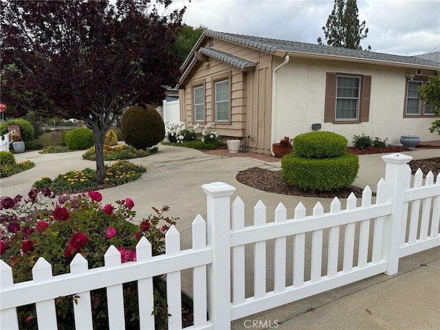 7940 Lena Ave, West Hills, CA 91304 - view of property exterior featuring a fenced front yard and stucco siding