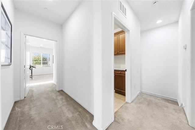 6410 Eucalyptus Ave, Chino, CA 91710 - corridor with light colored carpet, recessed lighting, baseboards, and visible vents