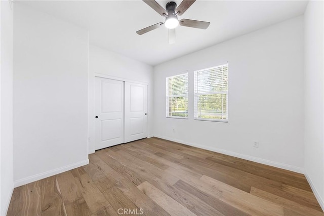 6410 Eucalyptus Ave, Chino, CA 91710 - empty room with baseboards, a ceiling fan, and wood finished floors