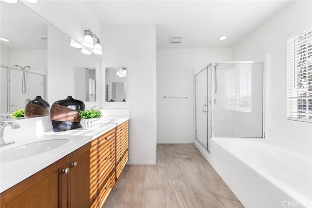 6410 Eucalyptus Ave, Chino, CA 91710 - full bath with a sink, double vanity, visible vents, a bath, and a stall shower