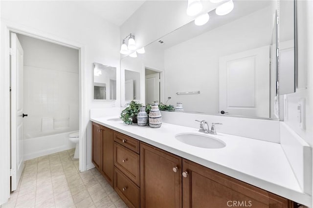 6410 Eucalyptus Ave, Chino, CA 91710 - bathroom featuring double vanity, a sink, shower / bathing tub combination, and toilet