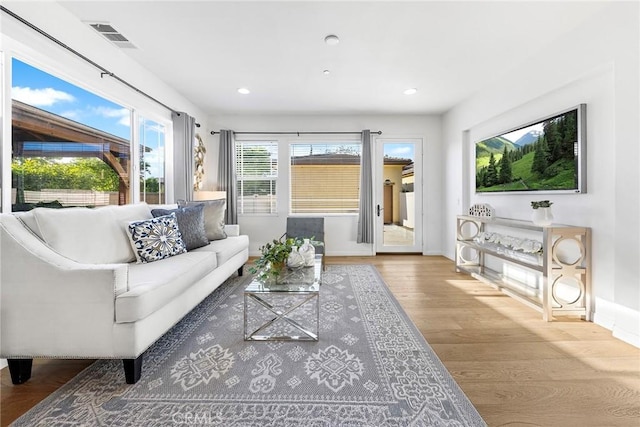 6410 Eucalyptus Ave, Chino, CA 91710 - living room featuring visible vents, recessed lighting, baseboards, and wood finished floors