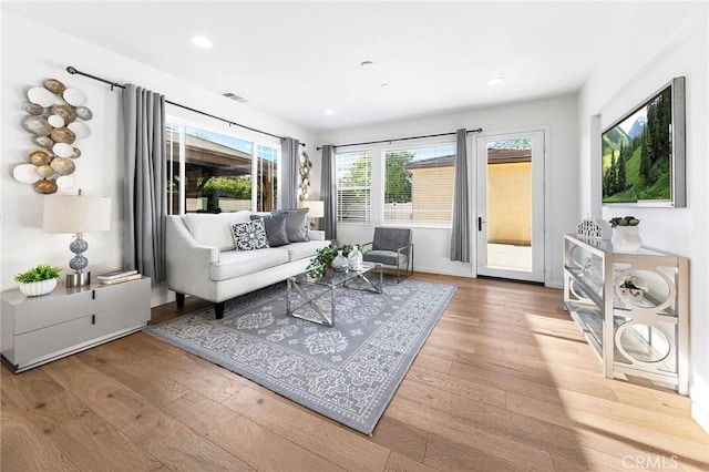 6410 Eucalyptus Ave, Chino, CA 91710 - living area with visible vents, recessed lighting, and wood-type flooring