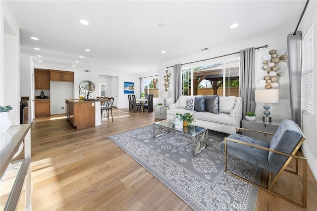 6410 Eucalyptus Ave, Chino, CA 91710 - living area featuring recessed lighting, visible vents, and light wood-type flooring