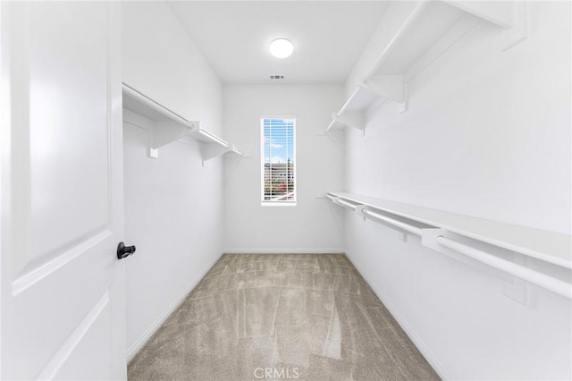 6410 Eucalyptus Ave, Chino, CA 91710 - walk in closet featuring light colored carpet and visible vents