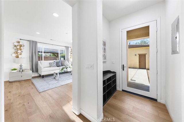 6410 Eucalyptus Ave, Chino, CA 91710 - interior space with baseboards, light wood finished floors, and electric panel