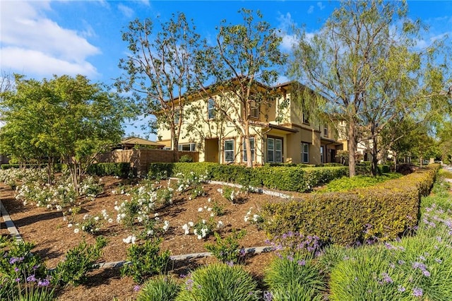 6410 Eucalyptus Ave, Chino, CA 91710 - back of property featuring stucco siding and fence