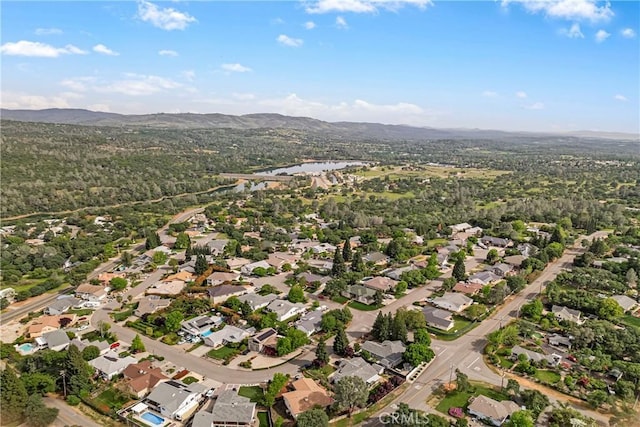 birds eye view of property with a residential view and a mountain view
