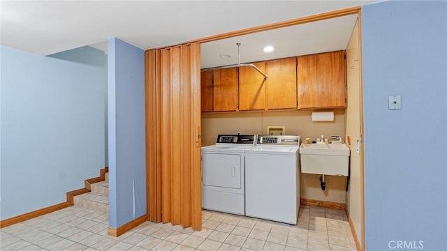 12782 Periwinkle Dr, North Tustin, CA 92705 - laundry room featuring washer and clothes dryer, cabinet space, baseboards, light tile patterned floors, and recessed lighting