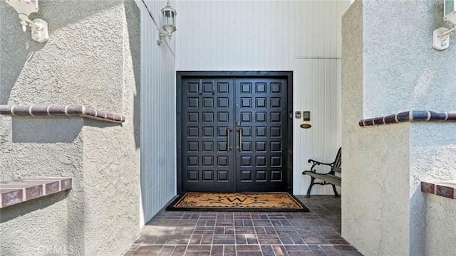 12782 Periwinkle Dr, North Tustin, CA 92705 - view of exterior entry with stucco siding