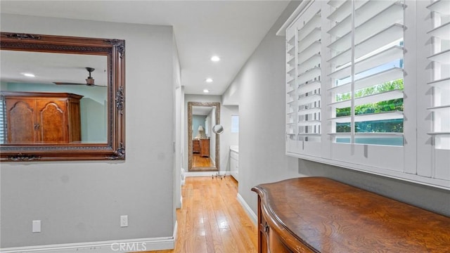 12782 Periwinkle Dr, North Tustin, CA 92705 - hall featuring light wood-style flooring, baseboards, and recessed lighting