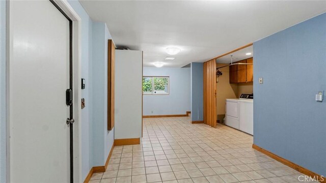 12782 Periwinkle Dr, North Tustin, CA 92705 - laundry area with washing machine and dryer, cabinet space, and baseboards